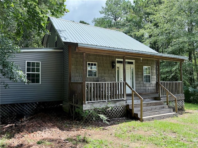 460 Waverly Rd, Auburn, AL 36832 - chalet / cabin with covered porch and a metal roof