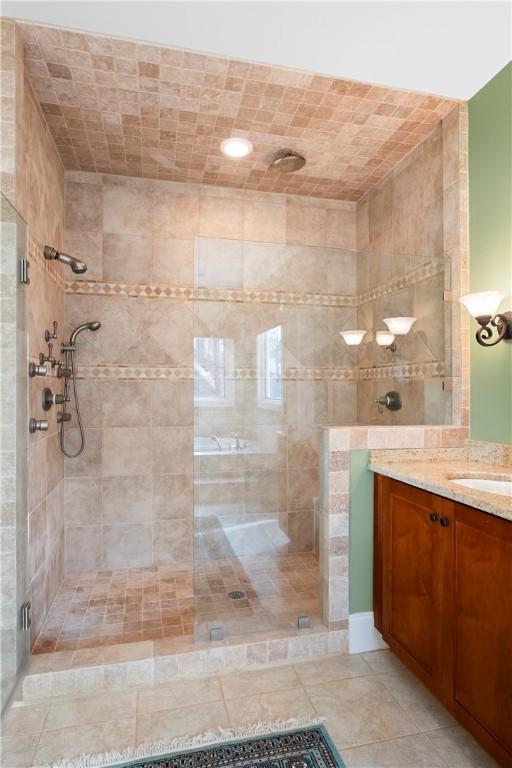 bathroom featuring vanity and walk in shower