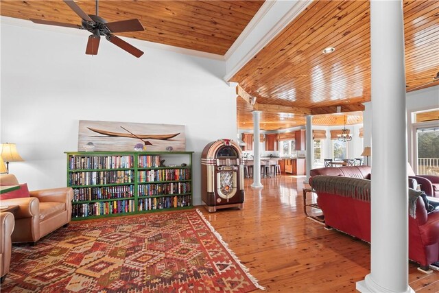 dining space featuring hardwood / wood-style floors, plenty of natural light, wood ceiling, and an inviting chandelier