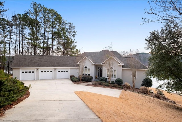 ranch-style house featuring a garage