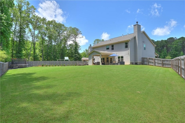 261 Woodward Way, Auburn, AL 36832 - view of yard with a trampoline