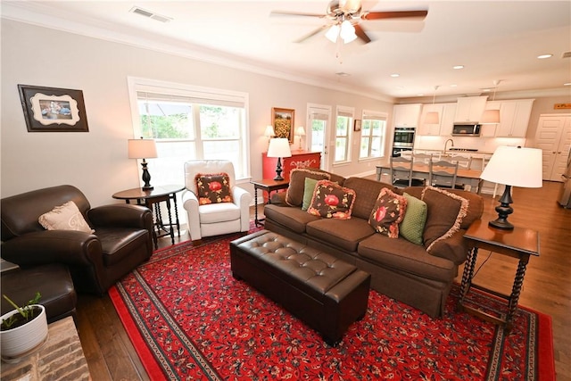 261 Woodward Way, Auburn, AL 36832 - living area with wood finished floors, crown molding, ceiling fan, and recessed lighting