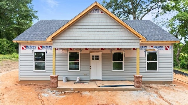 208 Byrd Ave, Opelika, AL 36801 - unfinished property with roof with shingles