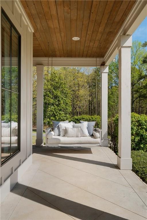 view of patio featuring a porch and outdoor lounge area