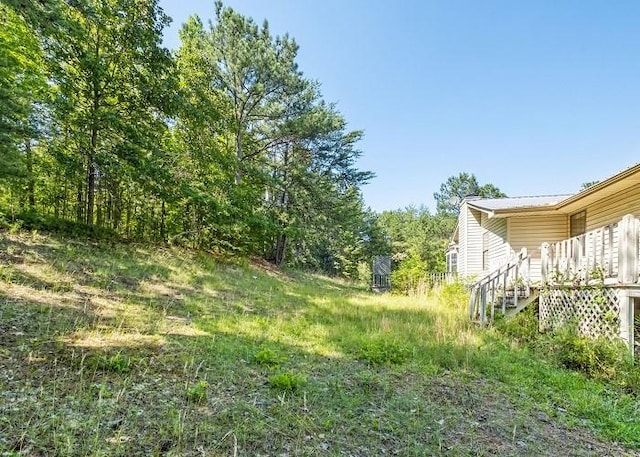 view of yard featuring a deck