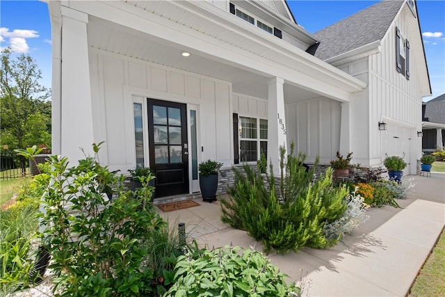 1835 Solamere Ct, Auburn, AL 36832 - property entrance with board and batten siding, a shingled roof, and a porch