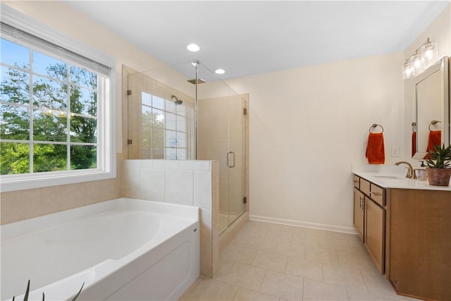 1835 Solamere Ct, Auburn, AL 36832 - full bathroom with a bath, vanity, a shower stall, tile patterned floors, and recessed lighting