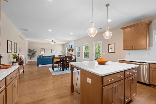1835 Solamere Ct, Auburn, AL 36832 - kitchen featuring dishwasher, light wood-style floors, recessed lighting, open floor plan, and light countertops