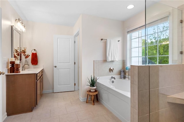 1835 Solamere Ct, Auburn, AL 36832 - full bath with vanity, a bath, tile patterned flooring, and an enclosed shower