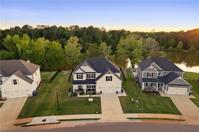 1835 Solamere Ct, Auburn, AL 36832 - view from above of property featuring a large body of water and a forest