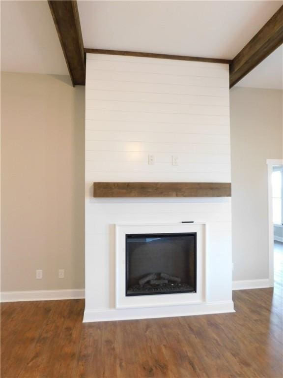 details with beam ceiling and hardwood / wood-style floors