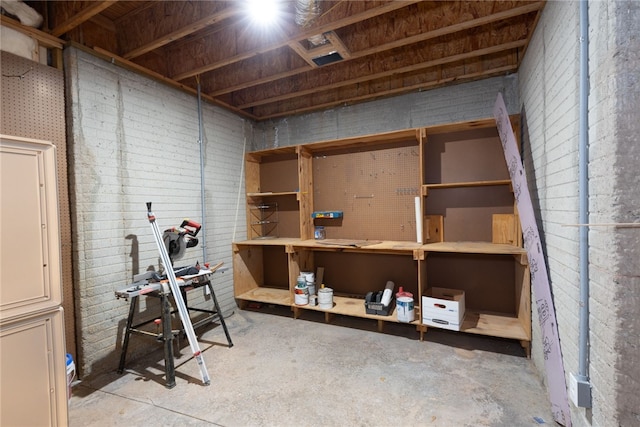 basement with a workshop area