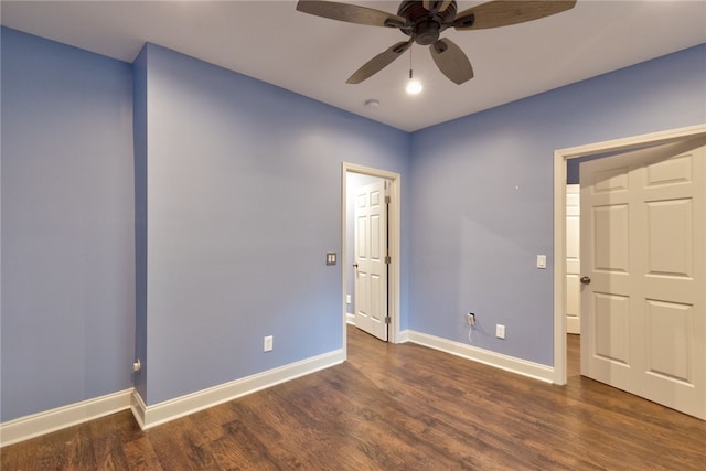 unfurnished bedroom with dark hardwood / wood-style floors and ceiling fan