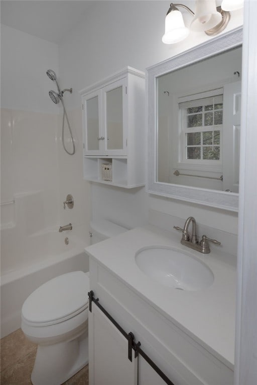 full bathroom with bathing tub / shower combination, vanity, and toilet