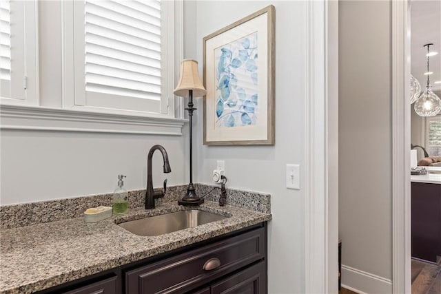 bathroom featuring hardwood / wood-style floors and vanity