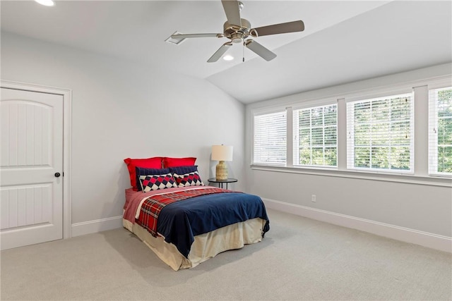 bedroom with carpet, ceiling fan, and lofted ceiling