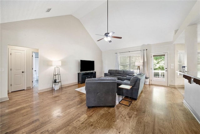 2107 Rockledge Cir, Opelika, AL 36801 - living room featuring high vaulted ceiling, ceiling fan, light wood-type flooring, and baseboards