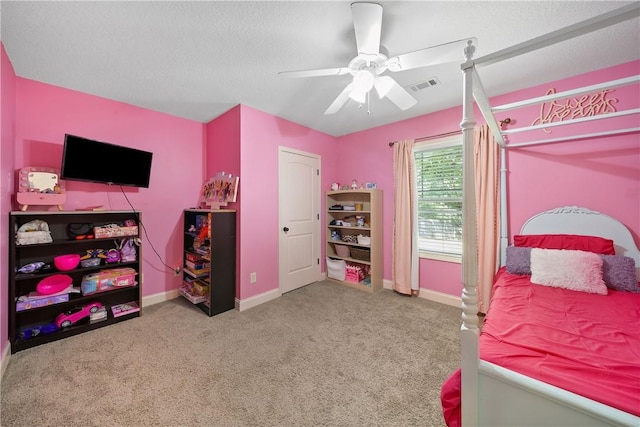 2107 Rockledge Cir, Opelika, AL 36801 - bedroom featuring carpet, baseboards, and a ceiling fan