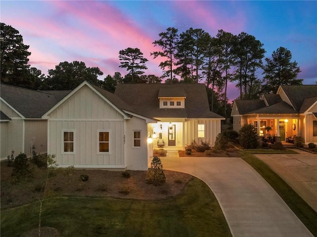 view of front of house with a yard