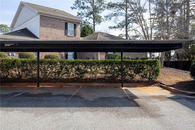 view of vehicle parking featuring a carport