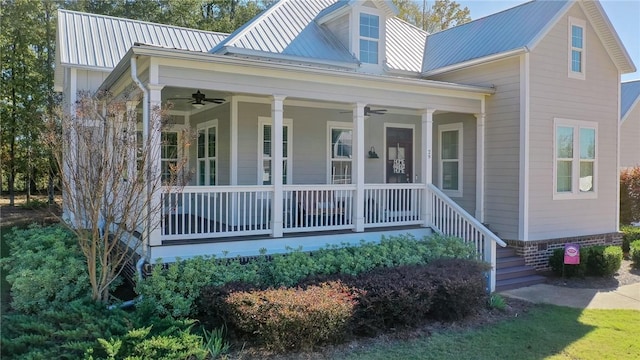 view of front of property featuring ceiling fan and covered porch