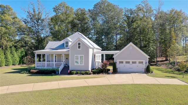 view of front of home with a porch, a garage, and a front yard