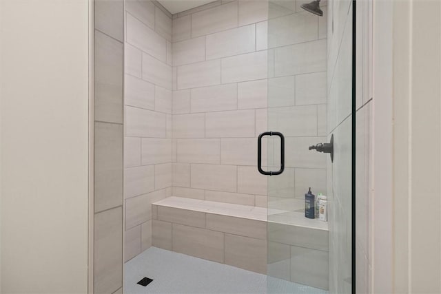 bathroom with a stall shower
