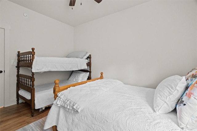 bedroom featuring a ceiling fan and wood finished floors