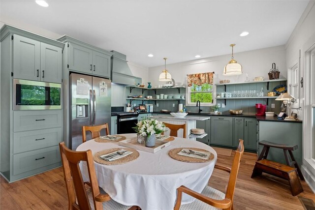 dining space with recessed lighting, visible vents, and light wood-style flooring