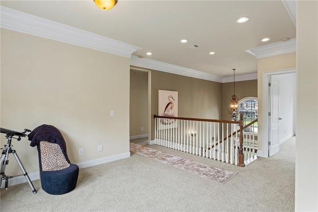 2182 Conservation Dr, Auburn, AL 36879 - living area with ornamental molding, carpet floors, an upstairs landing, a chandelier, and recessed lighting