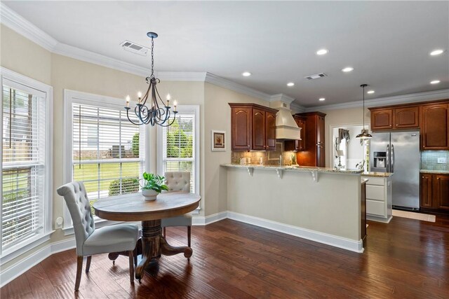 2182 Conservation Dr, Auburn, AL 36879 - dining room with a chandelier, dark wood-style floors, ornamental molding, baseboards, and recessed lighting