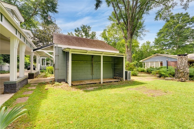 335 Woodfield Dr, Auburn, AL 36830 - view of green lawn featuring a carport