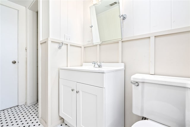 335 Woodfield Dr, Auburn, AL 36830 - bathroom featuring vanity and toilet