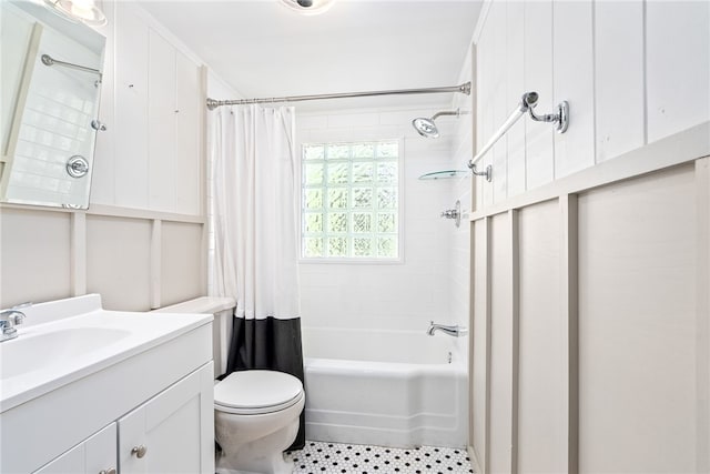 335 Woodfield Dr, Auburn, AL 36830 - bathroom featuring vanity, shower / bath combo with shower curtain, and tile patterned floors