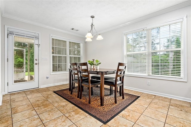 4339 Live Oak Dr, Auburn, AL 36830 - dining room with crown molding, healthy amount of natural light, light tile patterned floors, a chandelier, and baseboards