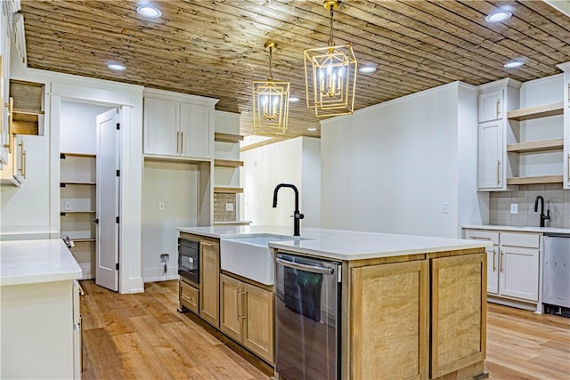 2307 Alpha Dr, Phenix City, AL 36867 - kitchen featuring open shelves, a sink, a chandelier, dishwasher, and an island with sink