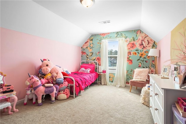 carpeted bedroom with lofted ceiling