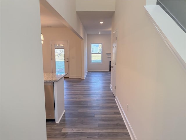 hall with dark hardwood / wood-style flooring