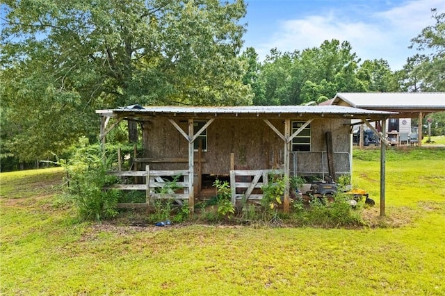 1066 Brown St, Valley, AL 36854 - surrounding community with an exterior structure, an outdoor structure, and a carport