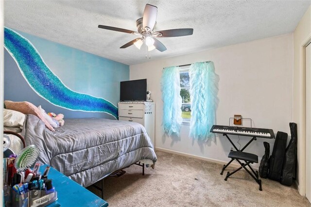 1066 Brown St, Valley, AL 36854 - bedroom with carpet, ceiling fan, and a textured ceiling