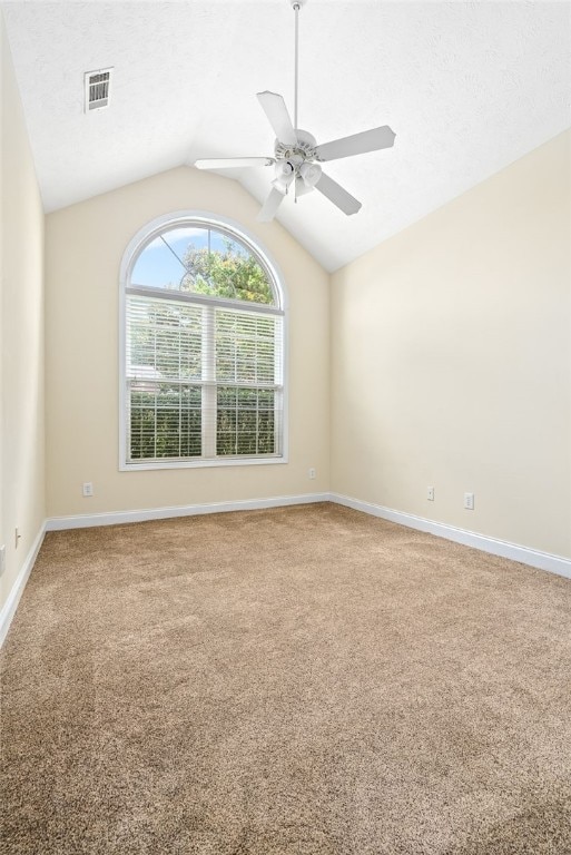 1317 Tulip Ct, Auburn, AL 36830 - unfurnished room with carpet, vaulted ceiling, and a ceiling fan