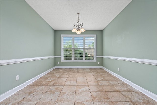 1317 Tulip Ct, Auburn, AL 36830 - unfurnished room with a chandelier and a textured ceiling