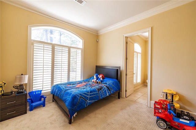56 Peachwood Dr, Tallassee, AL 36078 - bedroom with crown molding, multiple windows, light carpet, and baseboards