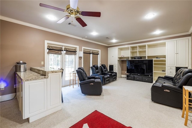 56 Peachwood Dr, Tallassee, AL 36078 - living area featuring crown molding, ceiling fan, and light colored carpet