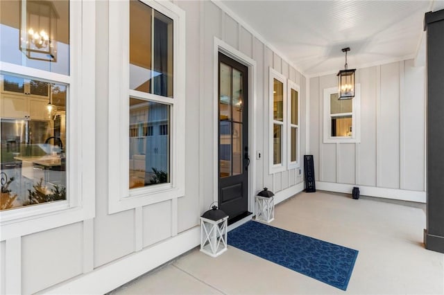 entrance to property featuring covered porch