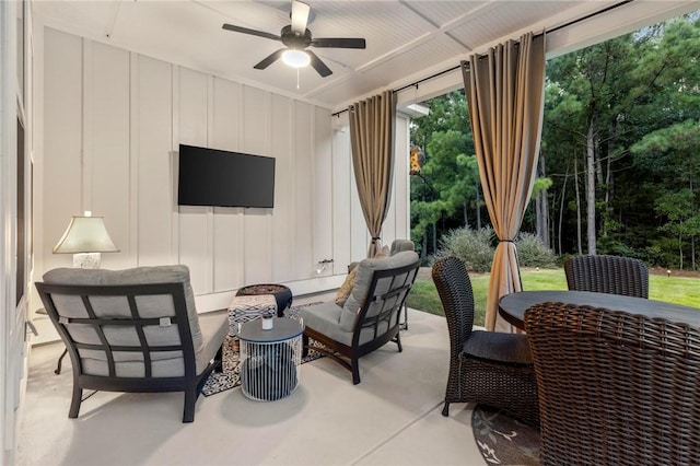 view of patio with ceiling fan and an outdoor hangout area