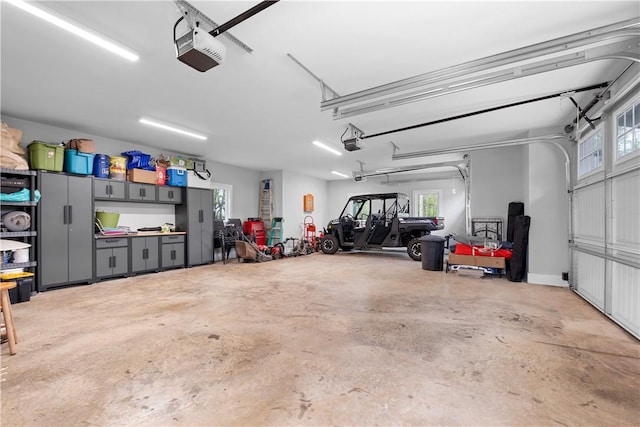 garage featuring a garage door opener