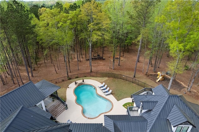 view of pool with a patio, a fenced in pool, and fence