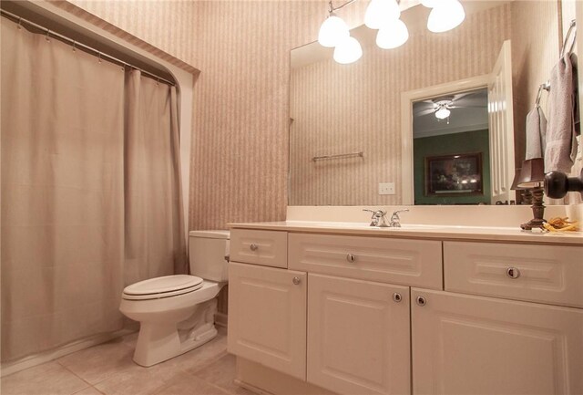 1849 Stoneridge Dr, Auburn, AL 36830 - bathroom featuring wallpapered walls, tile patterned floors, toilet, vanity, and a ceiling fan
