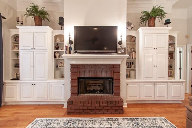 1849 Stoneridge Dr, Auburn, AL 36830 - living room with light wood finished floors, ornamental molding, and a fireplace